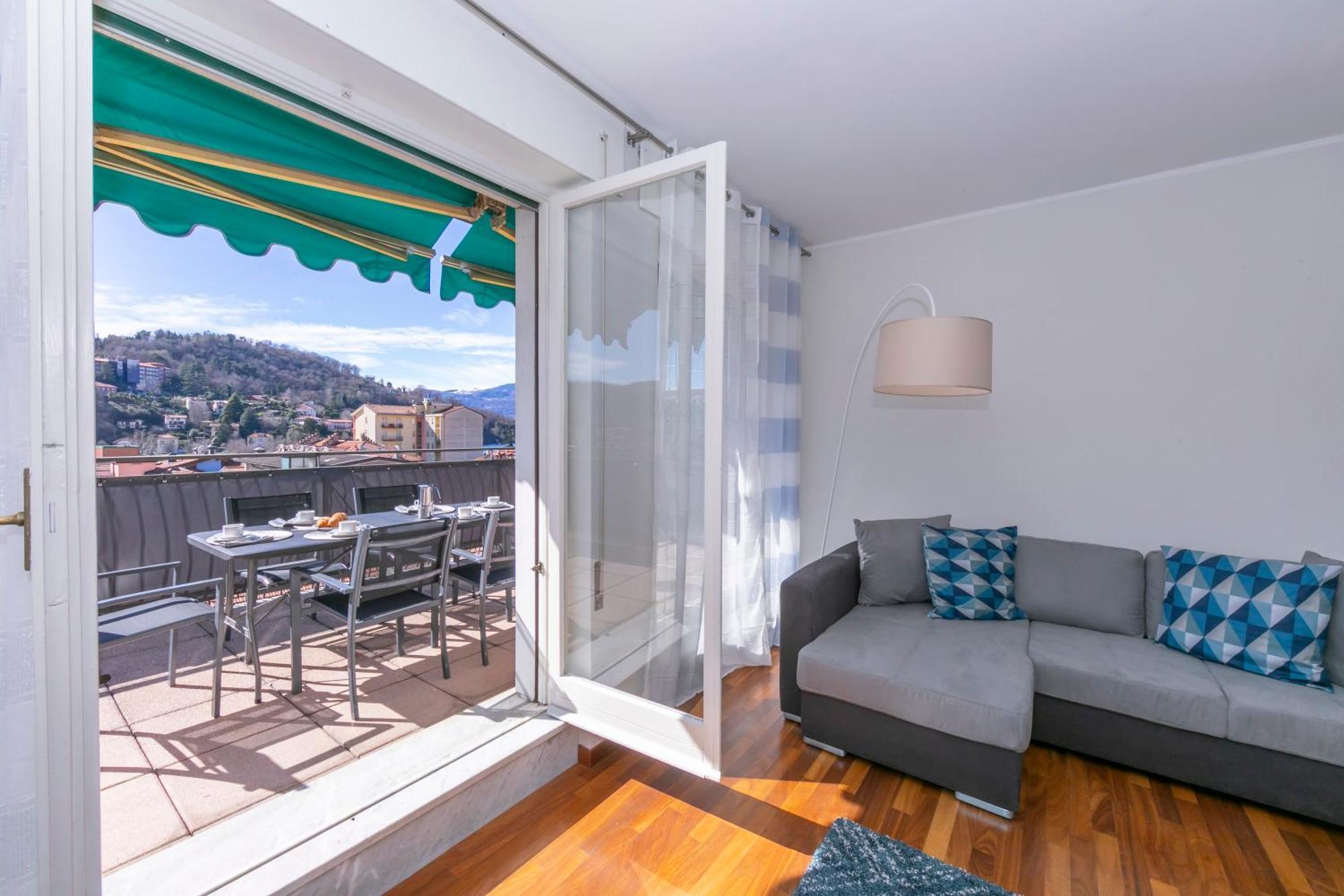 Appartamento Il Golfo Lake View - Happy Rentals Laveno Buitenkant foto
